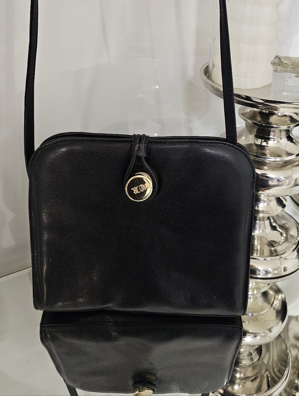 Carven Black Leather Crossbody with Gold Medallion